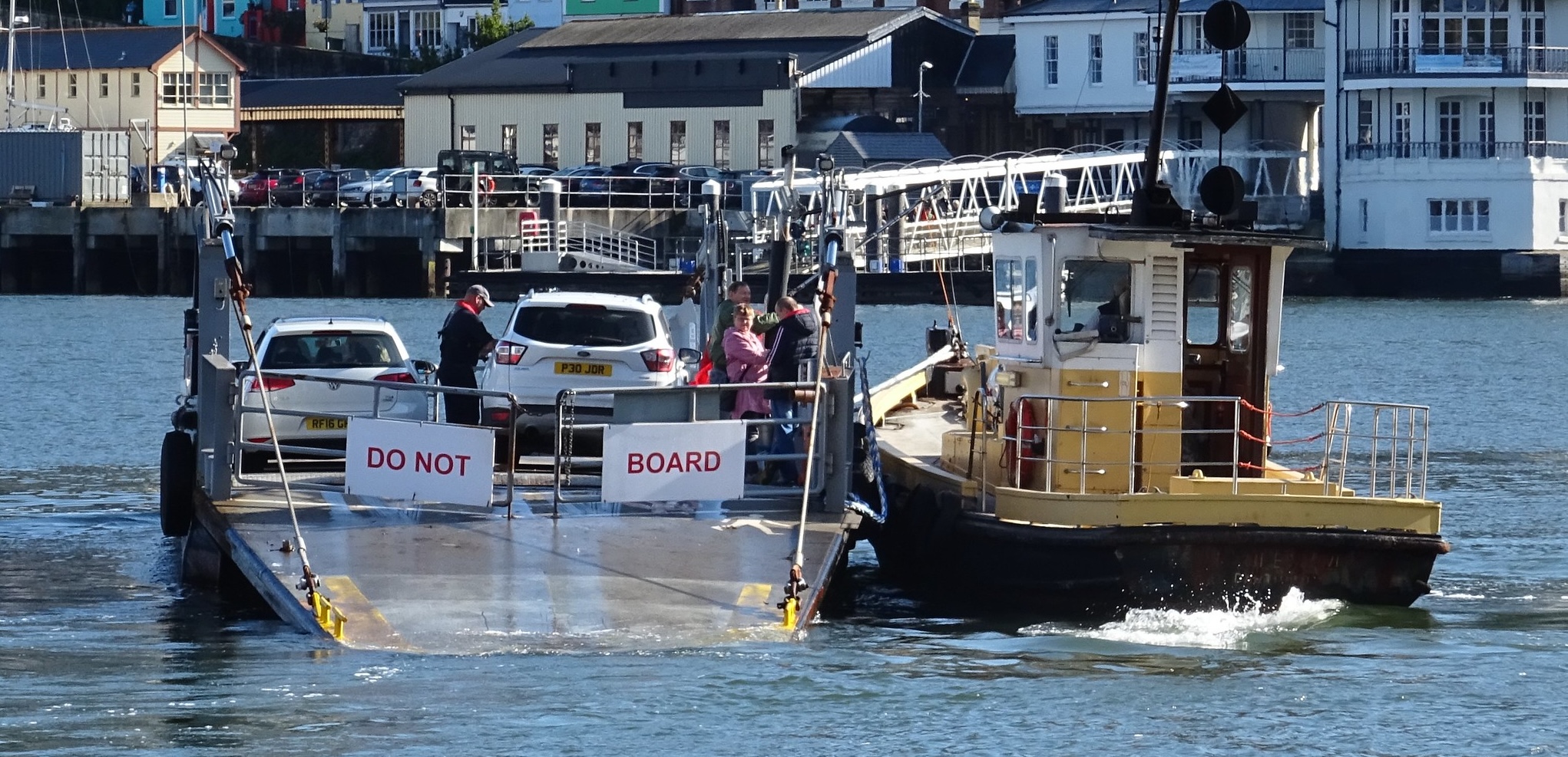 Dartmouth Lower Ferry carrying vehicles across the river Dart